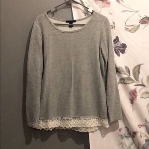 Laced bottom sweatshirt.